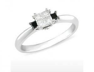 White-gold engagement ring with white diamonds and two princess-cut black diamonds.jpg